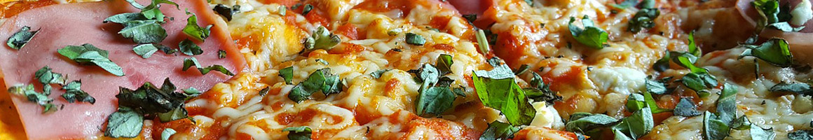 Eating Pizza at Hometown Pizza, Pasta & Bakery restaurant in Oroville, WA.